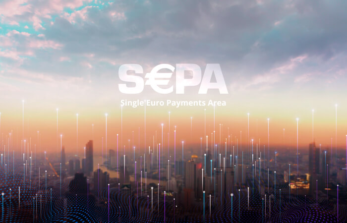 a city skyline in sunset colors is overlaid with the text "sepa: single euro payments area"